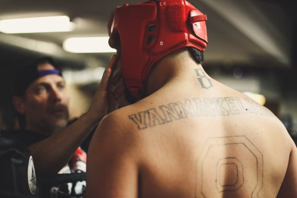 Person using training helmet inside the ring